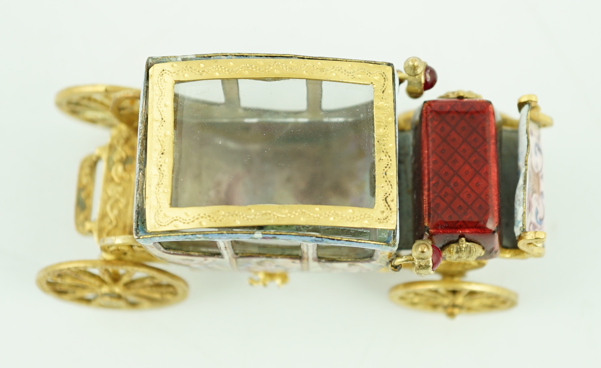 An early 20th century Viennese silver gilt and enamel miniature model of carriage, by Ludwig Pollitzer?